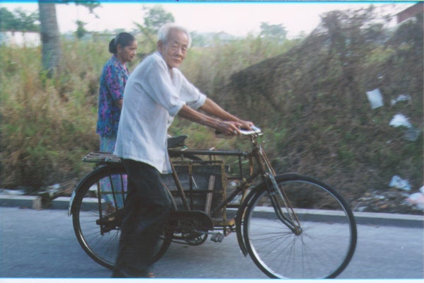 Old man and bicycle